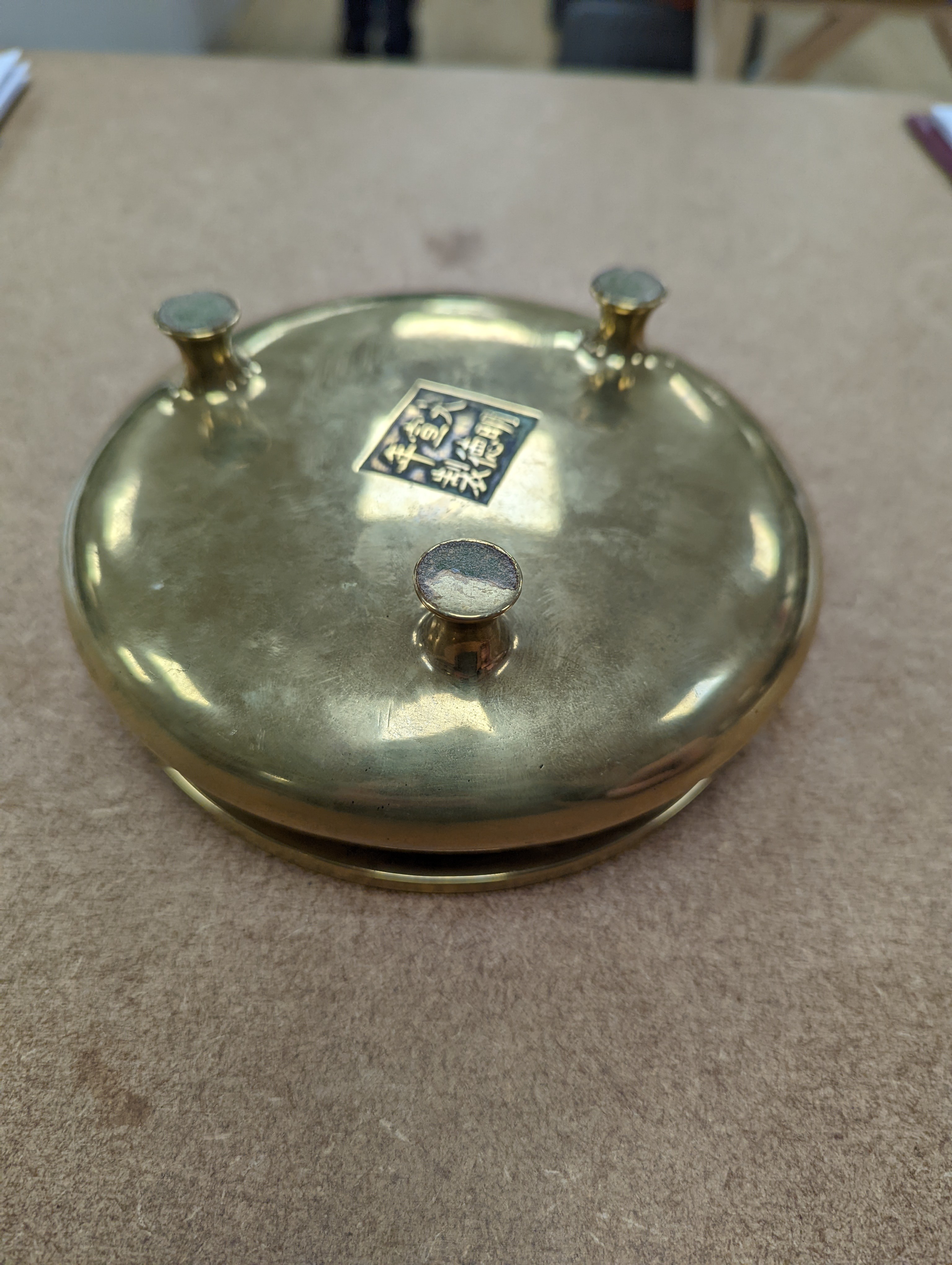 A Chinese bronze censer, ding, Xuande mark, 18th / 19th century, diameter 16.6cm, height 6.7cm